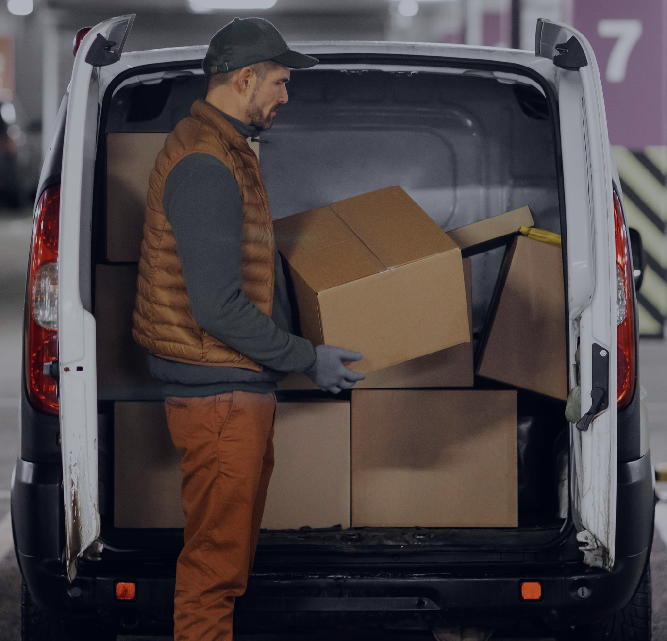 Shriners Transportation driver helping a student board an accessible vehicle